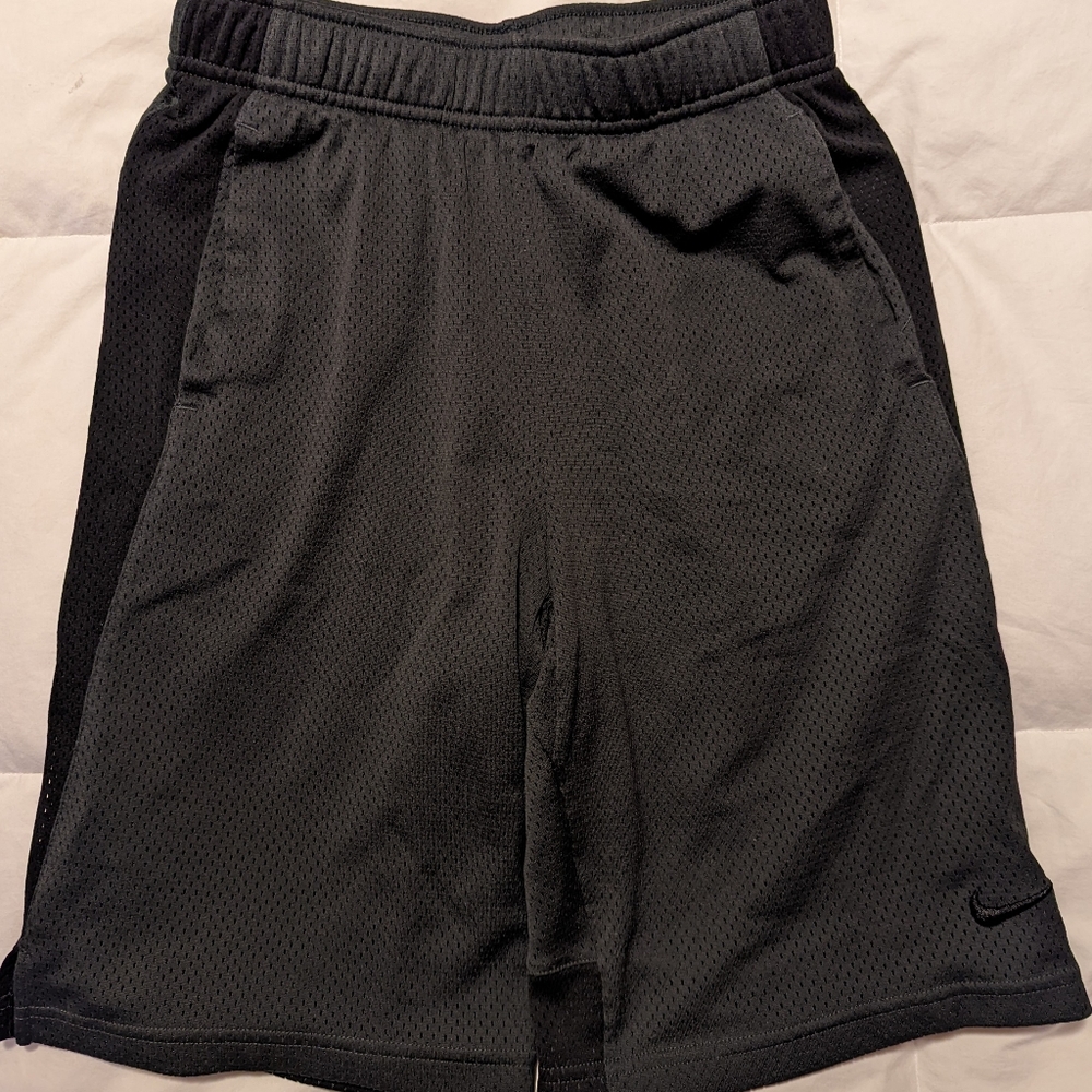 BOYS size large NIKE basketball shorts used like new